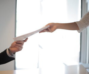 Women Passing Her Documents | Lanham, MD