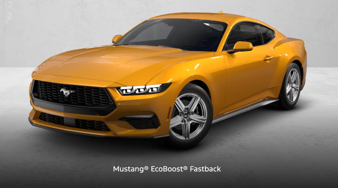 Orange Ford Mustang EcoBoost Fastback shown from a front three-quarter view.